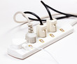 white multiple socket and plugs sideways