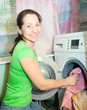 Mature woman doing laundry