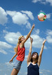 girls playing volleyball