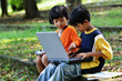 Boy and girl learning Computer