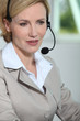 Woman with headset.