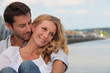 Couple by the river