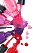 Ñolored nail polish  spilling from bottles