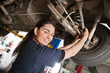 Portrait of smiling young female mechanic