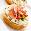 Breadroll with cream cheese and smoked bacon
