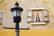 Vintage window on red cement wall