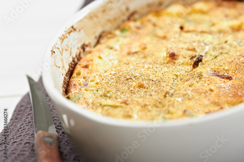 Photo: home pie with pepper onion, cheese and potatoes home pie with pepper onion, cheese and potatoes