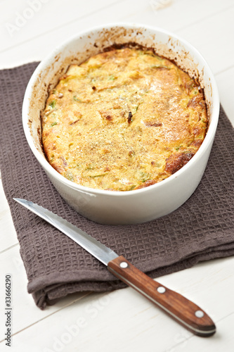 Photo: home pie with pepper onion, cheese and potatoes home pie with pepper onion, cheese and potatoes