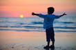 Little boy at sunset