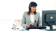 Attractive helpdesk consultant smiling to the camera