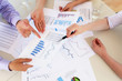 financial and business documents on the table