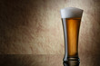 Beer into glass on a old stone Beer into glass on a old stone