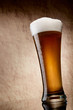 Beer into glass on a old stone Beer into glass on a old stone