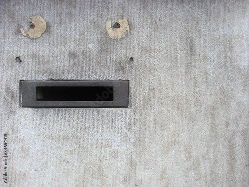 Photo: stone wall with mail-box looking like face stone wall with mail-box looking like face