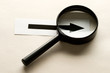 Magnifying glass and card