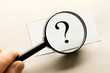 Magnifying glass in hand
