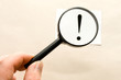 Magnifying glass in hand