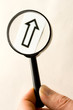 Magnifying glass in hand