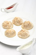 Kazakh or Uzbek Manti on a white plate