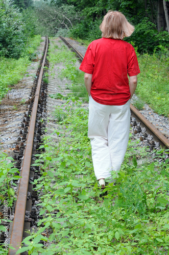 Photo: Walking Away Along Abandoned Railroad Track Walking Away Along Abandoned Railroad Track