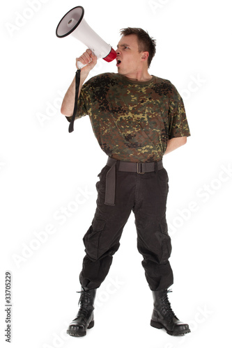 Photo: army man in camouflage shirt with megaphone army man in camouflage shirt with megaphone