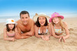 Portrait of happy family at the beach