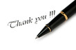 Thank you message and pen on white