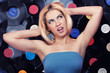 beautiful fashion woman on vinyl background