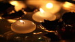Candles floating in water