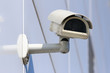 white security cctv camera on the modern facade
