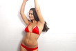 Slow motion dancing woman in red bikini