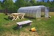 new bench near plastic of the hothouse