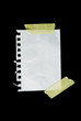 A sheet of paper isolated on black.