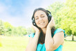 beauty smiling young woman with headphones outdoors beauty smiling young woman with headphones outdoors
