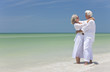 Happy Senior Couple Embracing on A Tropical Beach