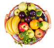 Fruit basket overhead - assortment, many varieties, isolated Fruit basket overhead - assortment, many varieties, isolated
