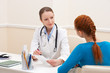 Doctor advises woman patient Doctor advises woman patient