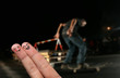 Happy finger hug in front of an urban skater