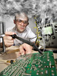 Funny nerd scientist soldering at vintage laboratory