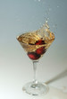 Cherry in a glass with champagne