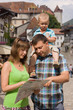 Family looking at map
