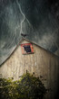 Spooky old barn with crows on a stormy night Spooky old barn with crows on a stormy night