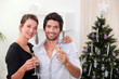young couple celebrating New Year's Eve