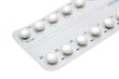 Birth control pills on white