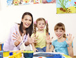 Child painting in preschool.