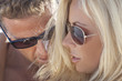 Sexy Attractive Man and Woman Couple Happy In Sunglasses