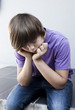 jeune adolescent boudeur