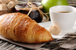 Breakfast with coffee, french croissant and jam Breakfast with coffee, french croissant and jam