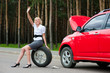 Blonde and broken car