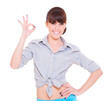 smiley woman showing the ok sign smiley woman showing the ok sign